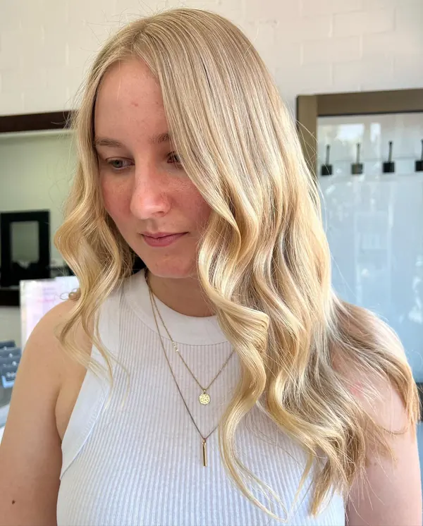 Golden blonde with loose curls