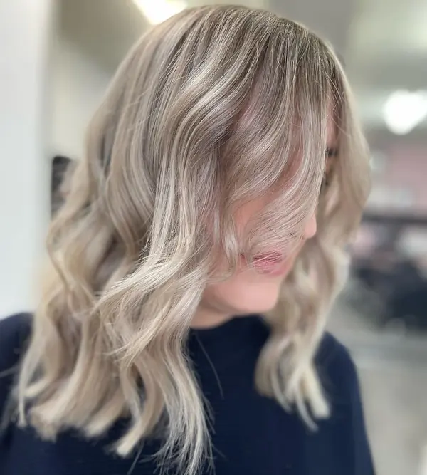 Creamy blonde with face-framing pieces